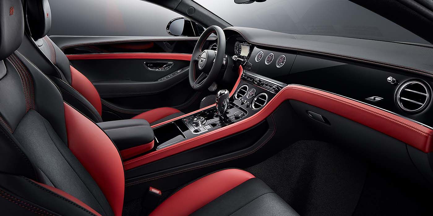 Bentley Suomi Bentley Continental GT S coupe front interior in Beluga black and Hotspur red hide with high gloss Carbon Fibre veneer