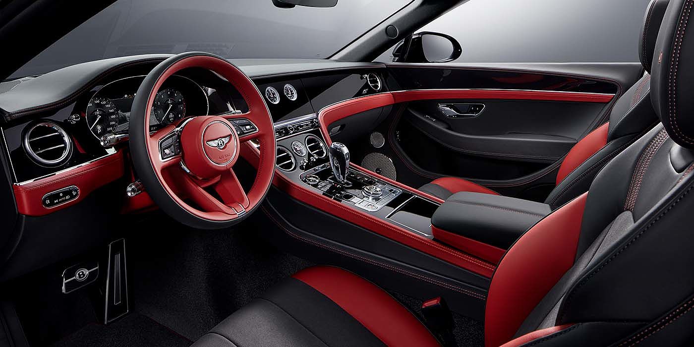 Bentley Suomi Bentley Continental GTC S convertible front interior in Beluga black and Hotspur red hide with high gloss carbon fibre veneer
