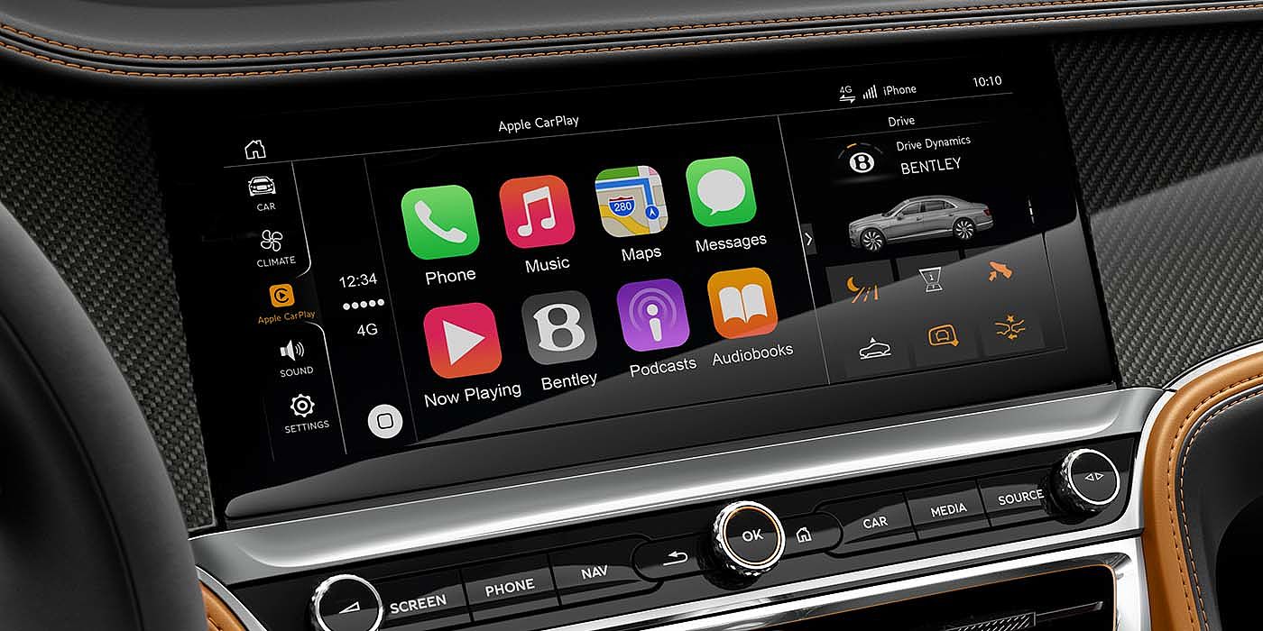 Bentley Suomi Bentley Flying Spur Speed with High Gloss Carbon Fibre veneer featuring a multifunction in car entertainment touch screen. 