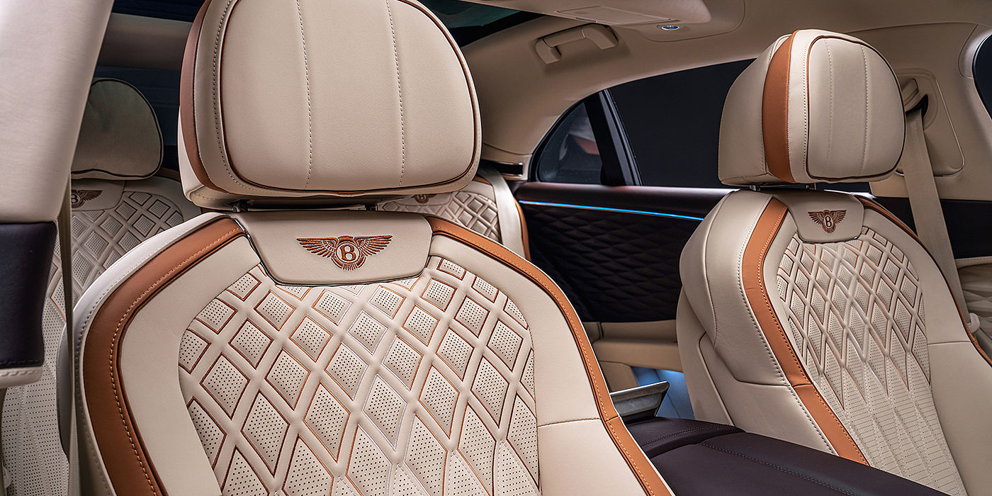 Bentley Suomi Bentley Flying Spur Odyssean sedan rear seat detail with Diamond quilting and Linen and Burnt Oak hides
