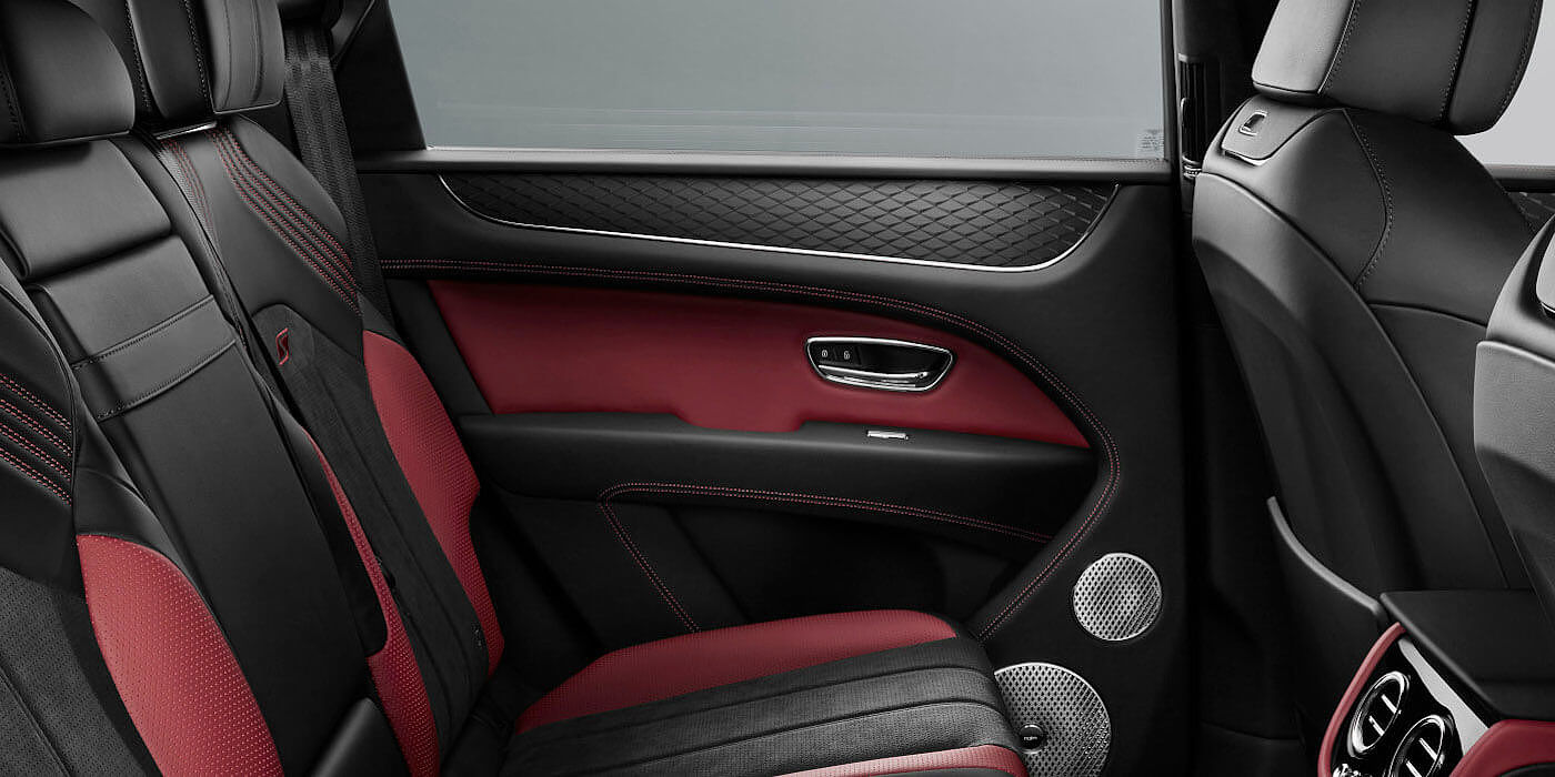 Bentley Suomi Bentley Bentayga S SUV rear interior in Beluga black and Hotspur red hide