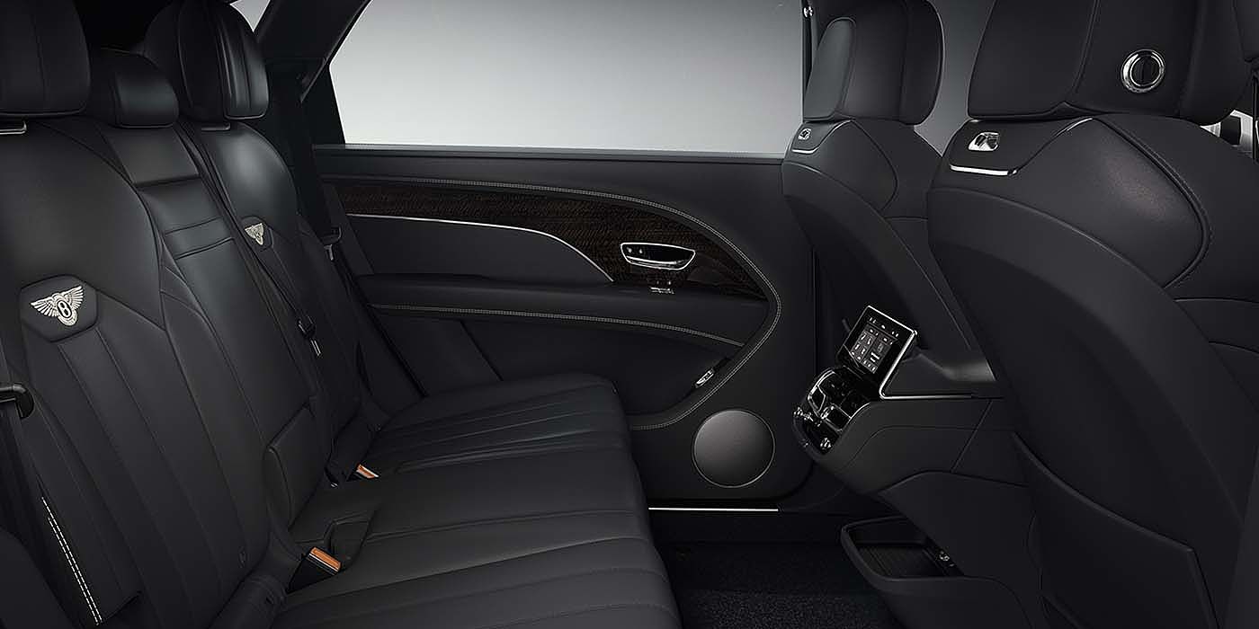 Bentley Suomi Bentley Bentayga EWB SUV rear interior in Beluga black leather