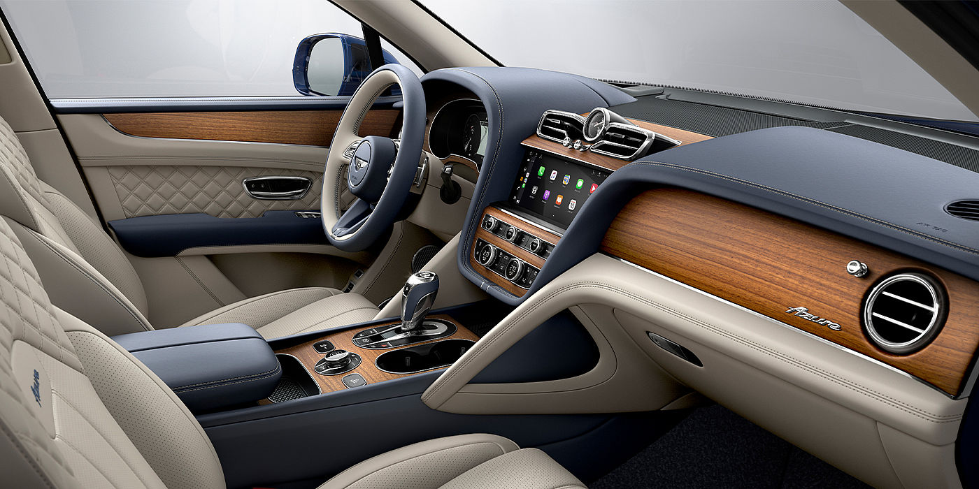 Bentley Suomi Bentley Bentayga Azure SUV front interior in Imperial Blue and Linen hide
