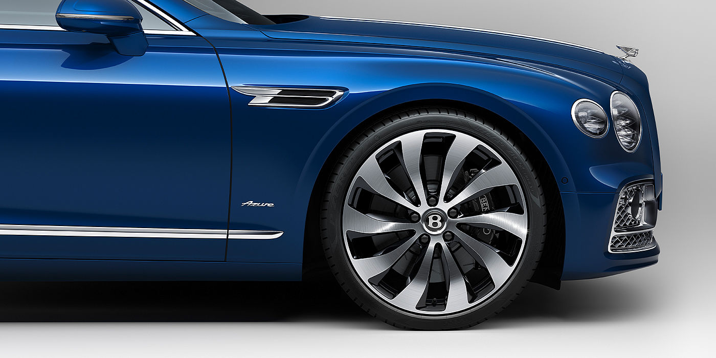 Bentley Suomi Bentley Flying Spur Azure sedan side close up in Sequin Blue paint with Azure badge