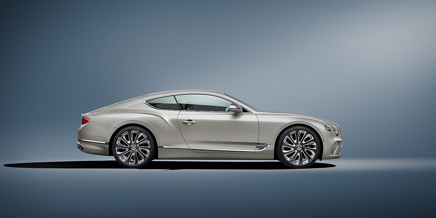 Bentley Suomi Bentley Continental GT Mulliner coupe in White Sand paint front 34
