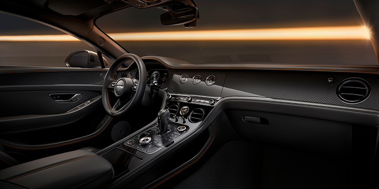 Bentley Suomi Bentley Continental GT Black Edition coupe front interior with Beluga black hide and High Gloss Carbon Fibre veneer