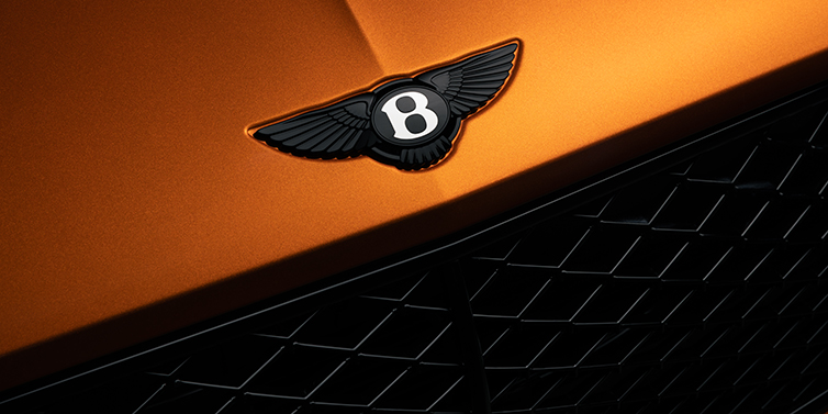 Bentley Suomi Bentley Continental GT coupe bonnet close up with black Bentley Wings bonnet badge